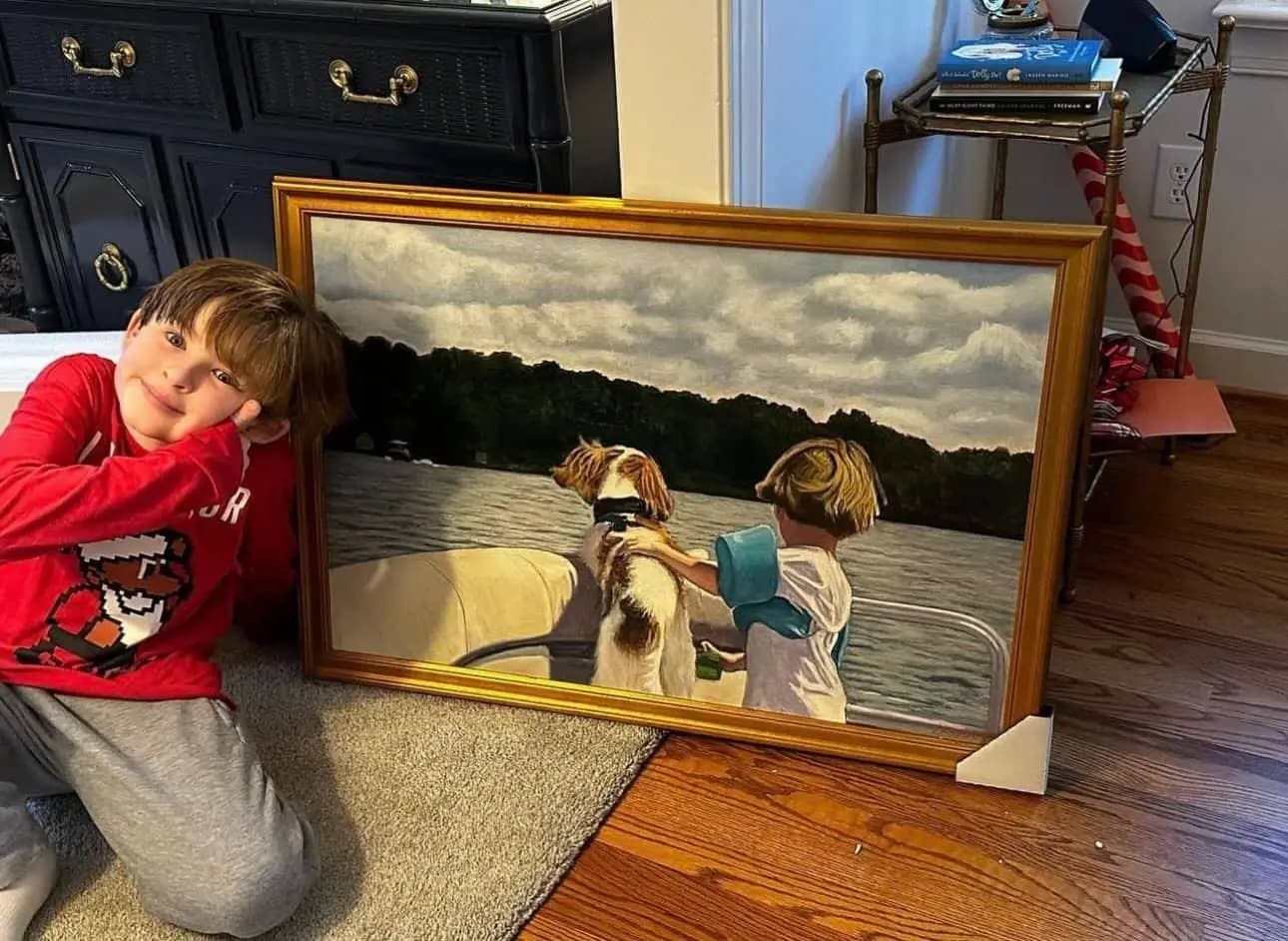 Child and framed artwork